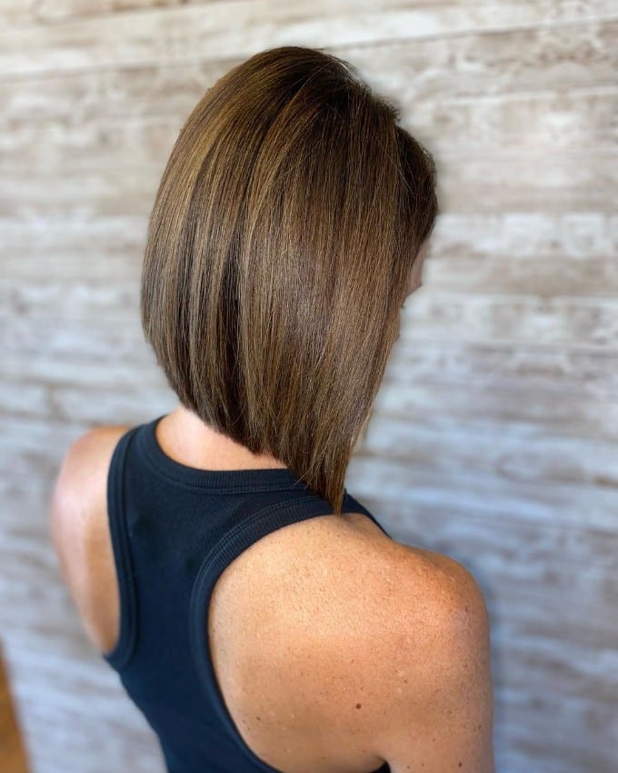 Deep Side Parted Bob Haircut with Layers and Bangs