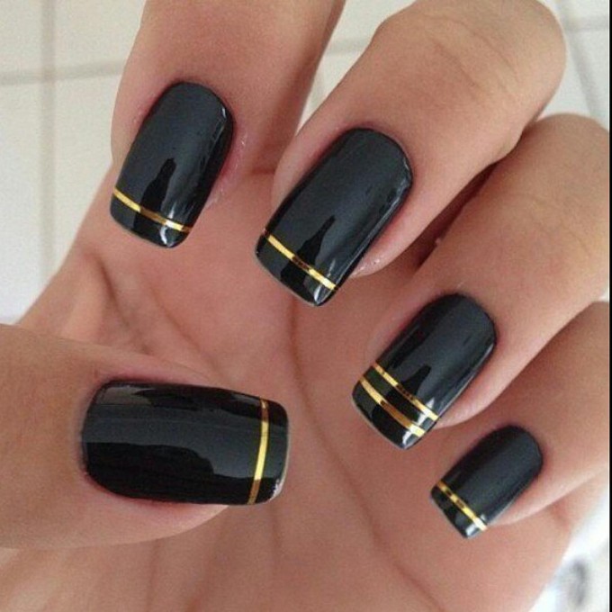 Black Nail Art Design With Gold Stripes