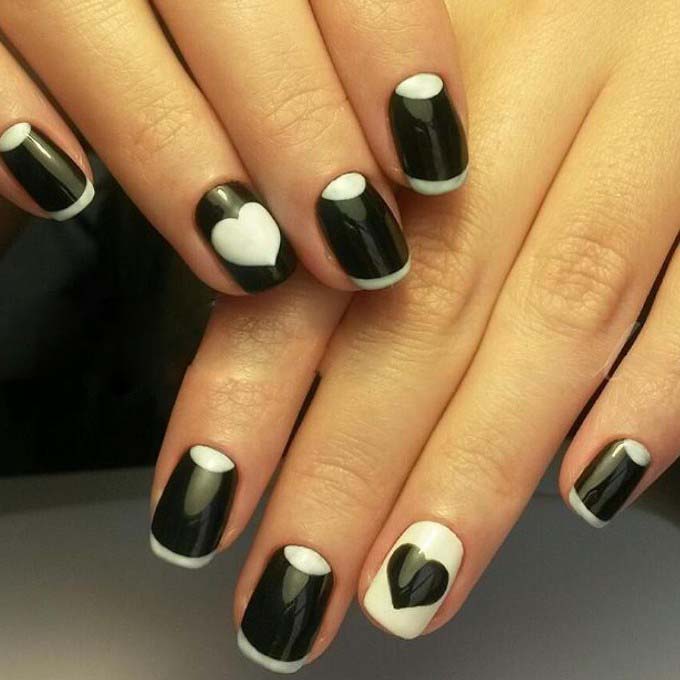 Black heart on white nails