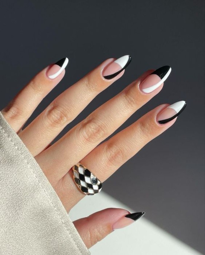 Chic black and white almond nails