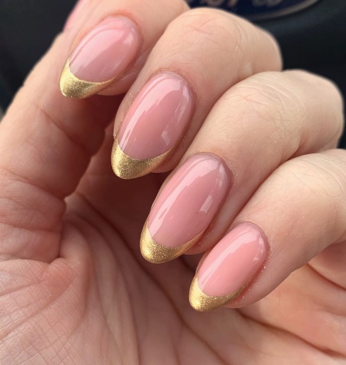 Gold French tip nails
