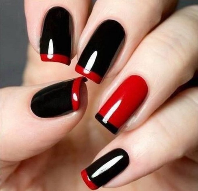 black nails with red tips