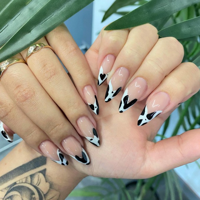 Curved tips, black and white nails