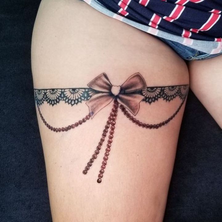 Bow Tattoo on Thigh