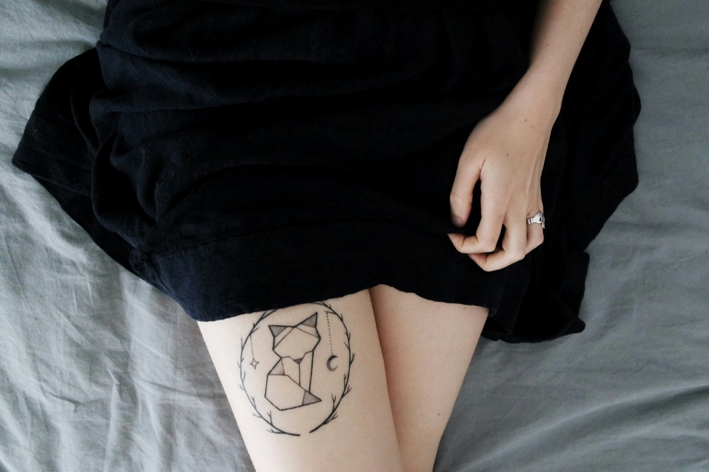 cat leg tattoo